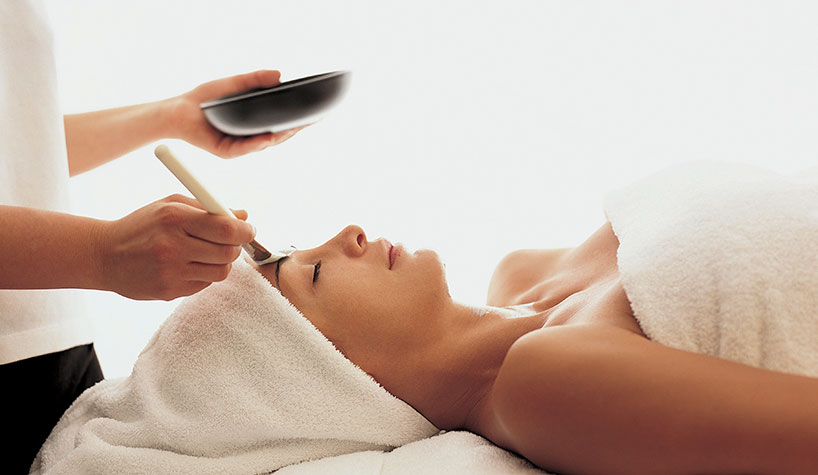 A guest receives a facial at Hotel Principe di Savoia: Club 10 Fitness & Beauty Center.