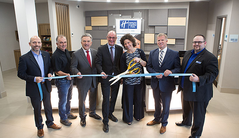 IHG celebrated the opening of its 100th Holiday Inn Express hotel in Canada with a ribbon cutting. Joining Kristopher Wekarchuk, director of Holiday Inn Express & Suites hotel operations, were Gaétan Laplante, construction foreman, Robert Robin, chairman of the board of Groupe Robin, Yves Lévesque, mayor of the City of Trois-Rivières, Nellie Robin, president of Groupe Robin, Stuart Laurie, director, franchise sale and development for IHG banner and Frédéric Bilodeau, general manager of Holiday Inn Express & Suites Trois-Rivières.