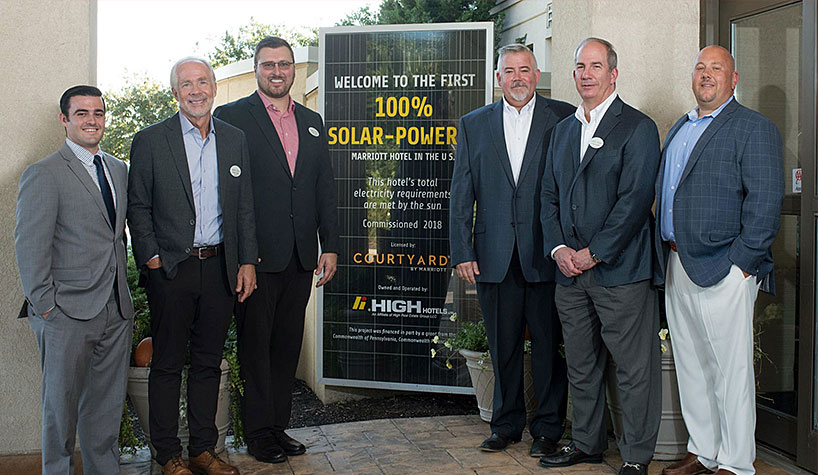 Representatives of High Hotels and local dignitaries were on hand as the hotel went 100% solar-powered.