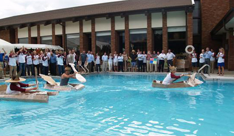 A canoe race serves as a team-building activity at the Lincolnshire Marriott Resort.