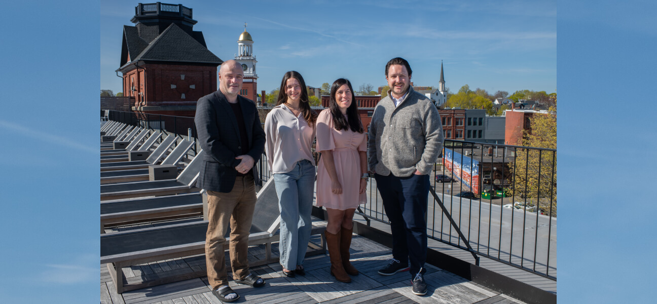 LEFT TO RIGHT: Norm O’Reilly, dean of the College of Business at UNE; business student Lily Hagen; Aimee Vlachos, business professor; and Justin Grimes, managing partner, Atlantic Hospitality, on the room of The Lincoln Hotel in Biddeford, ME